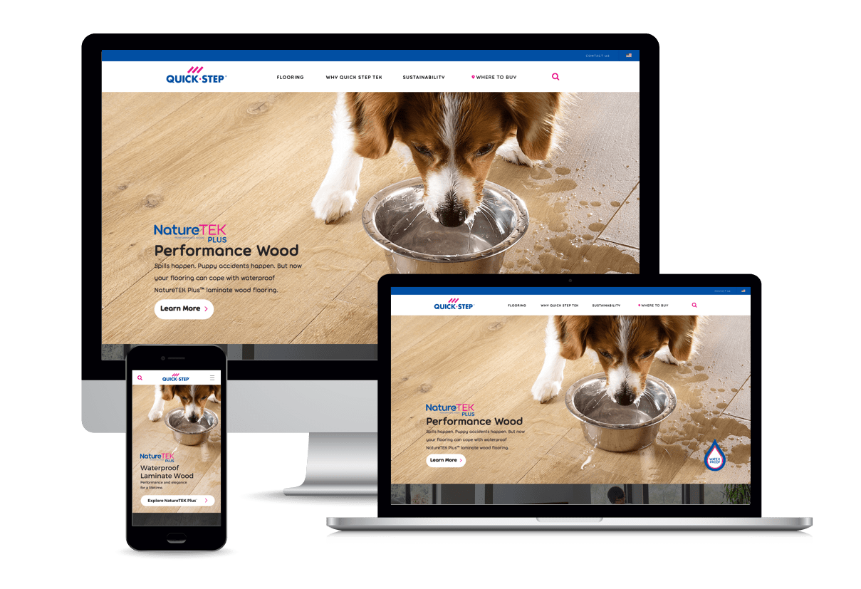 QuickStep - header.png: Responsive website design for Quick-Step flooring, showcasing waterproof laminate wood flooring with a dog drinking from a bowl on the floor.